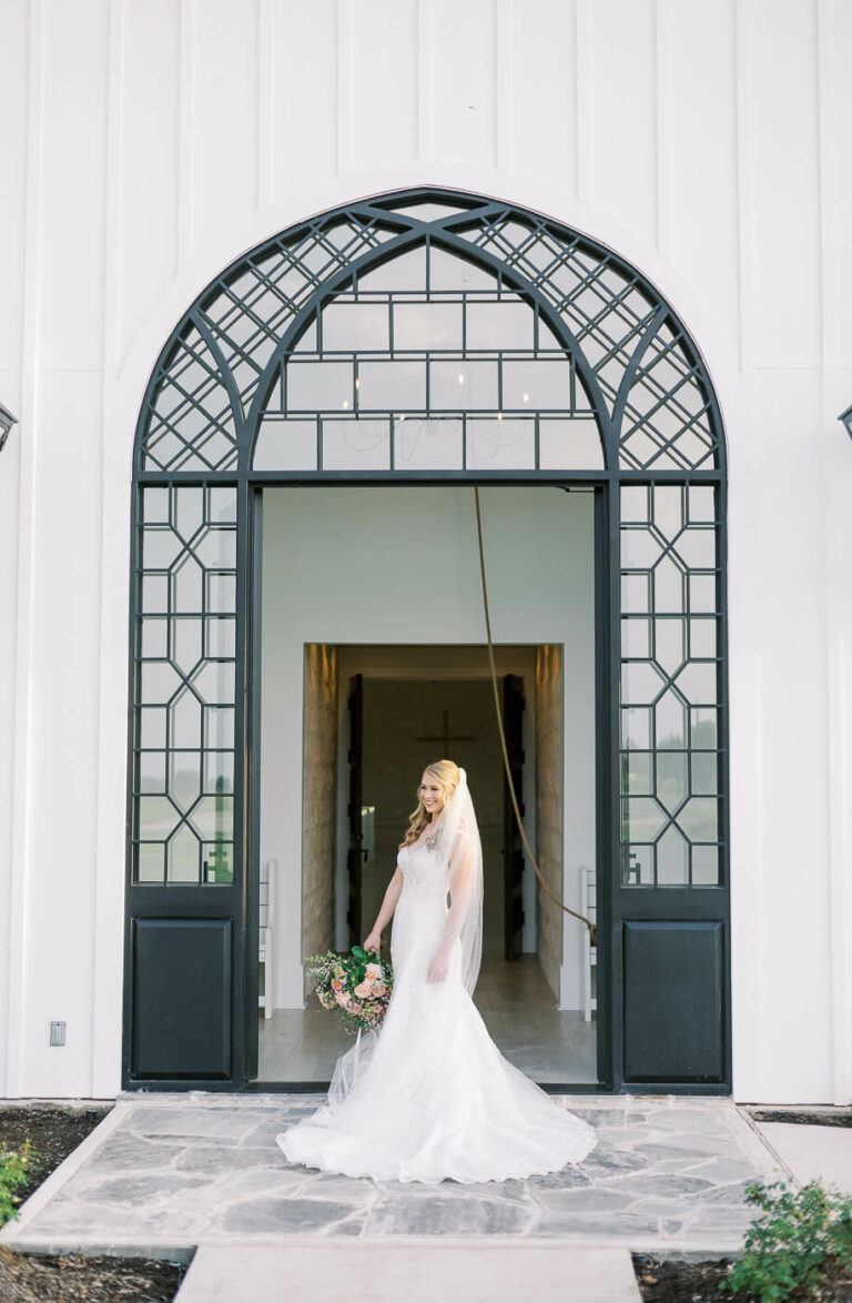 bridals in front of chapel at Camp Hosea venue